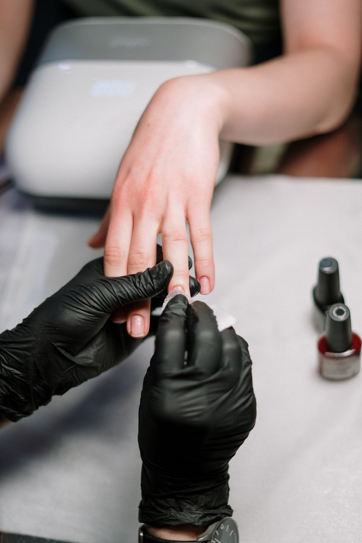 Manicure in progress at It's M3 Time Nail Salon